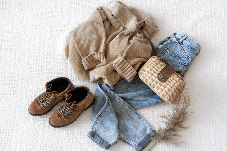 conjunto de roupa formado por calças, camisola e botas criado através do armário cápsula de outono/inverno